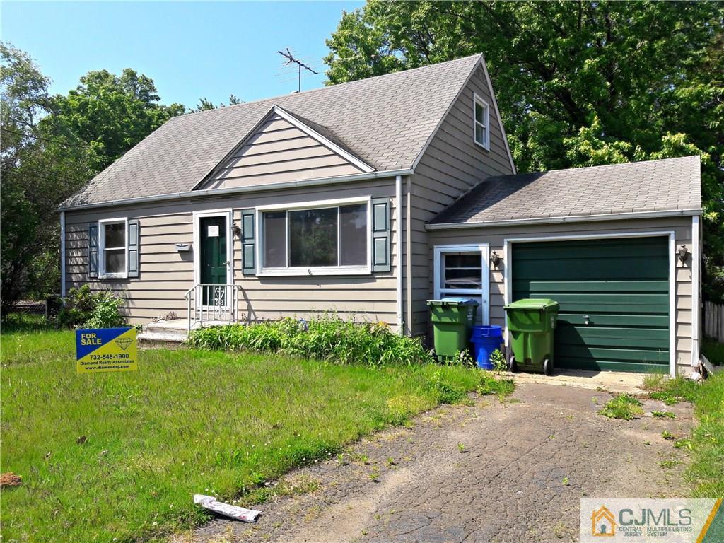 4 Sine Road Edison, NJ 08817 - Photo 2 of 25 a front view of a house with a yard