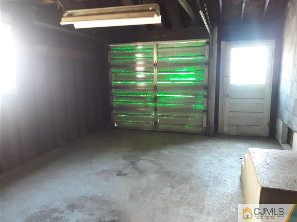 4 Sine Road Edison, NJ 08817 - Photo 15 of 25 a view of a room that has a small yard