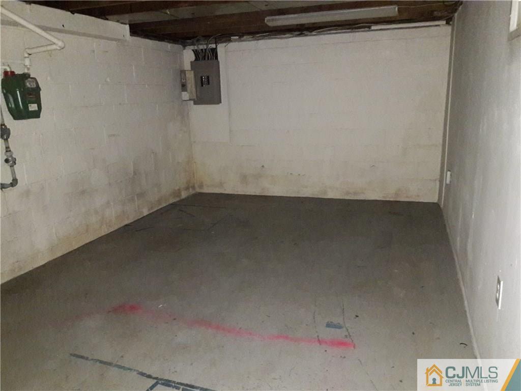 4 Sine Road Edison, NJ 08817 - Photo 17 of 25 a view of a room with racks on the wall