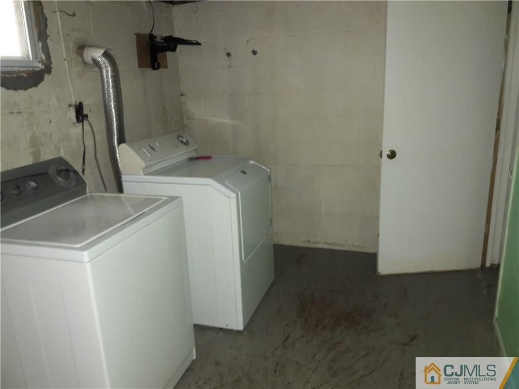 4 Sine Road Edison, NJ 08817 - Photo 19 of 25 a utility room with dryer and washer