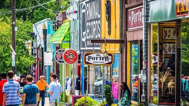 an aerial view of multiple houses with yard