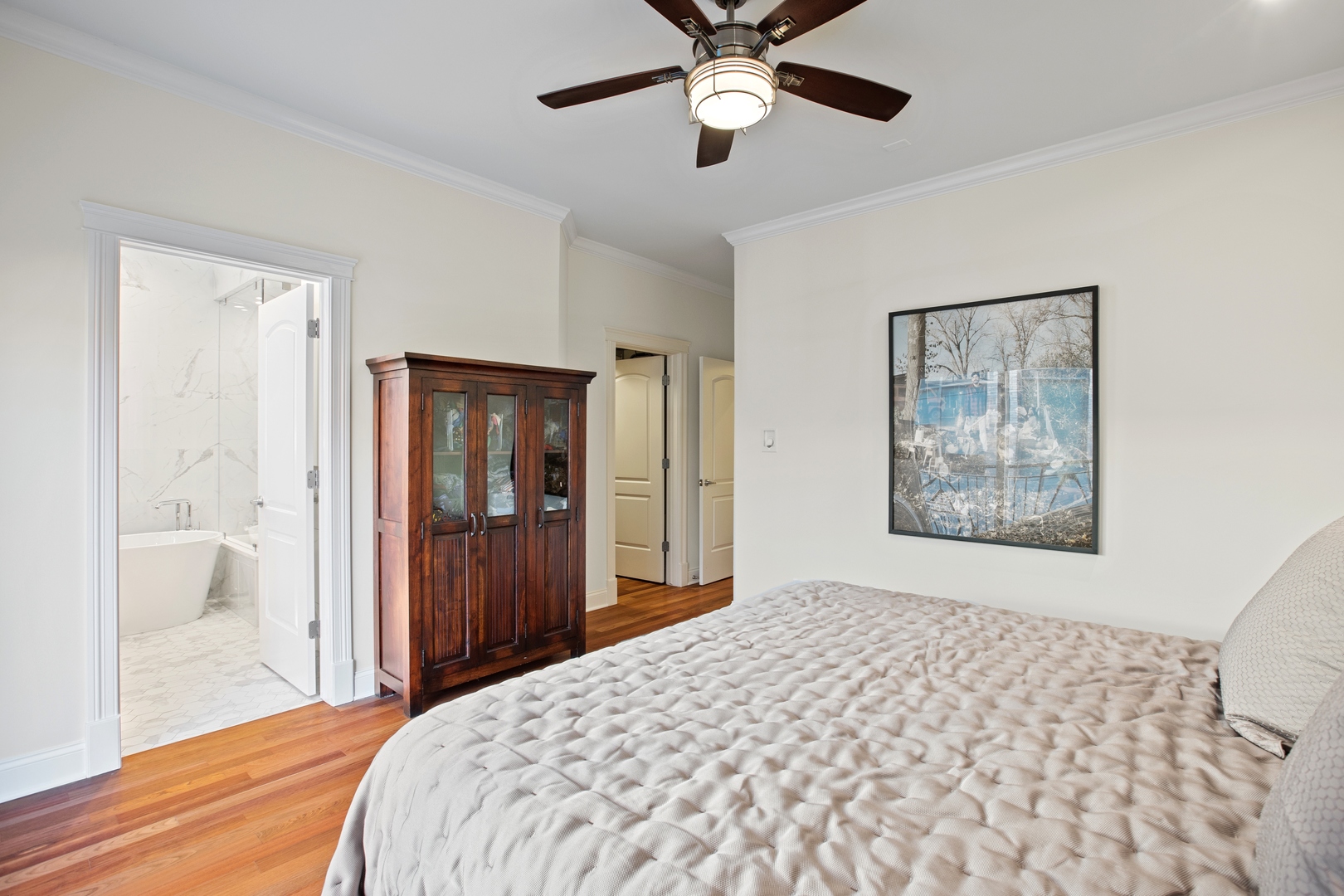 39 North Morgan Street, Unit 4 Chicago, IL 60607 - Photo 14 of 24 a bedroom with a bed and a window