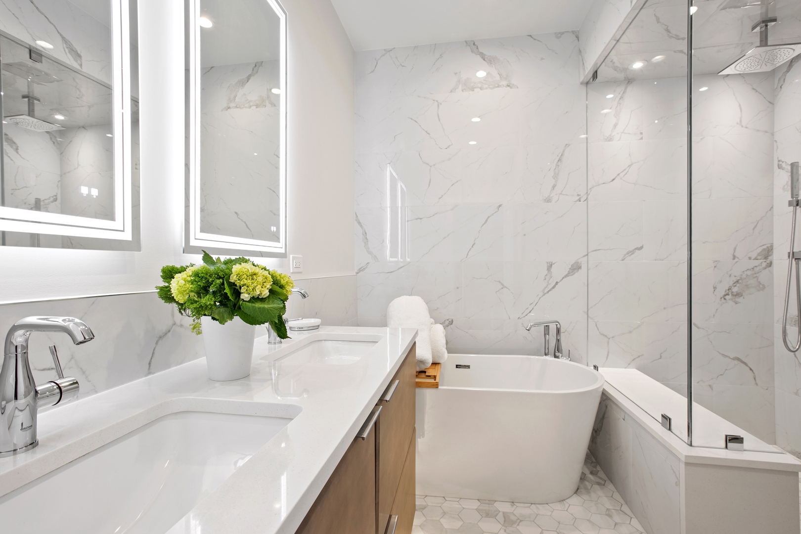 39 North Morgan Street, Unit 4 Chicago, IL 60607 - Photo 15 of 24 a bathroom with a bathtub sink and mirror