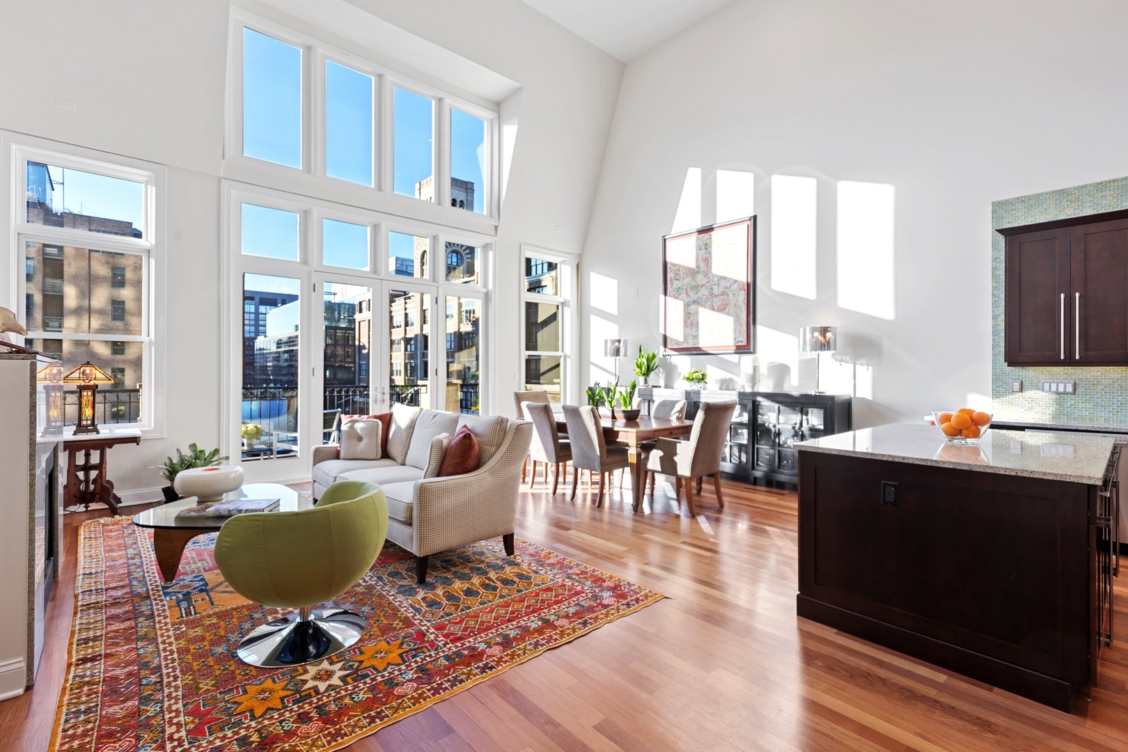 39 North Morgan Street, Unit 4 Chicago, IL 60607 - Photo 2 of 24 a living room with furniture a rug and a floor to ceiling window