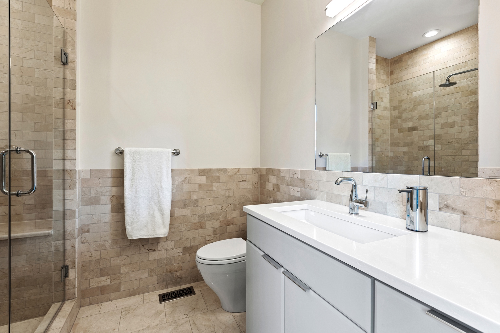 39 North Morgan Street, Unit 4 Chicago, IL 60607 - Photo 21 of 24 a bathroom with a sink toilet and shower