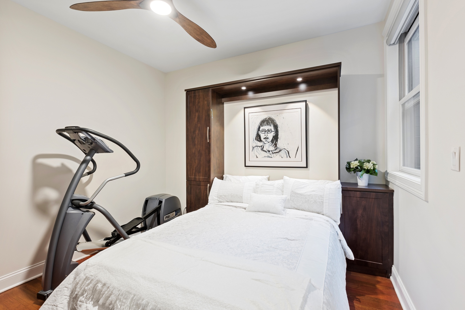 39 North Morgan Street, Unit 4 Chicago, IL 60607 - Photo 9 of 24 a bedroom with bed and wooden floor