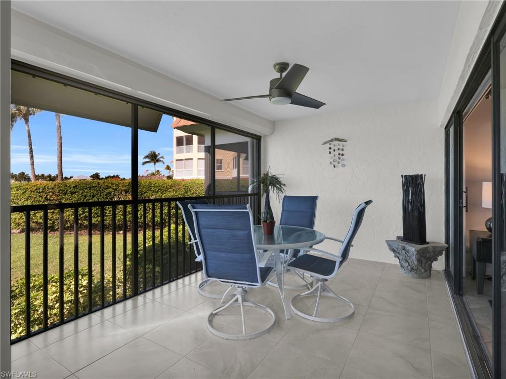 750 West Elkcam Circle, Unit 107 Marco Island, FL 34145 - Photo 30 of 33 View of sunroom / solarium