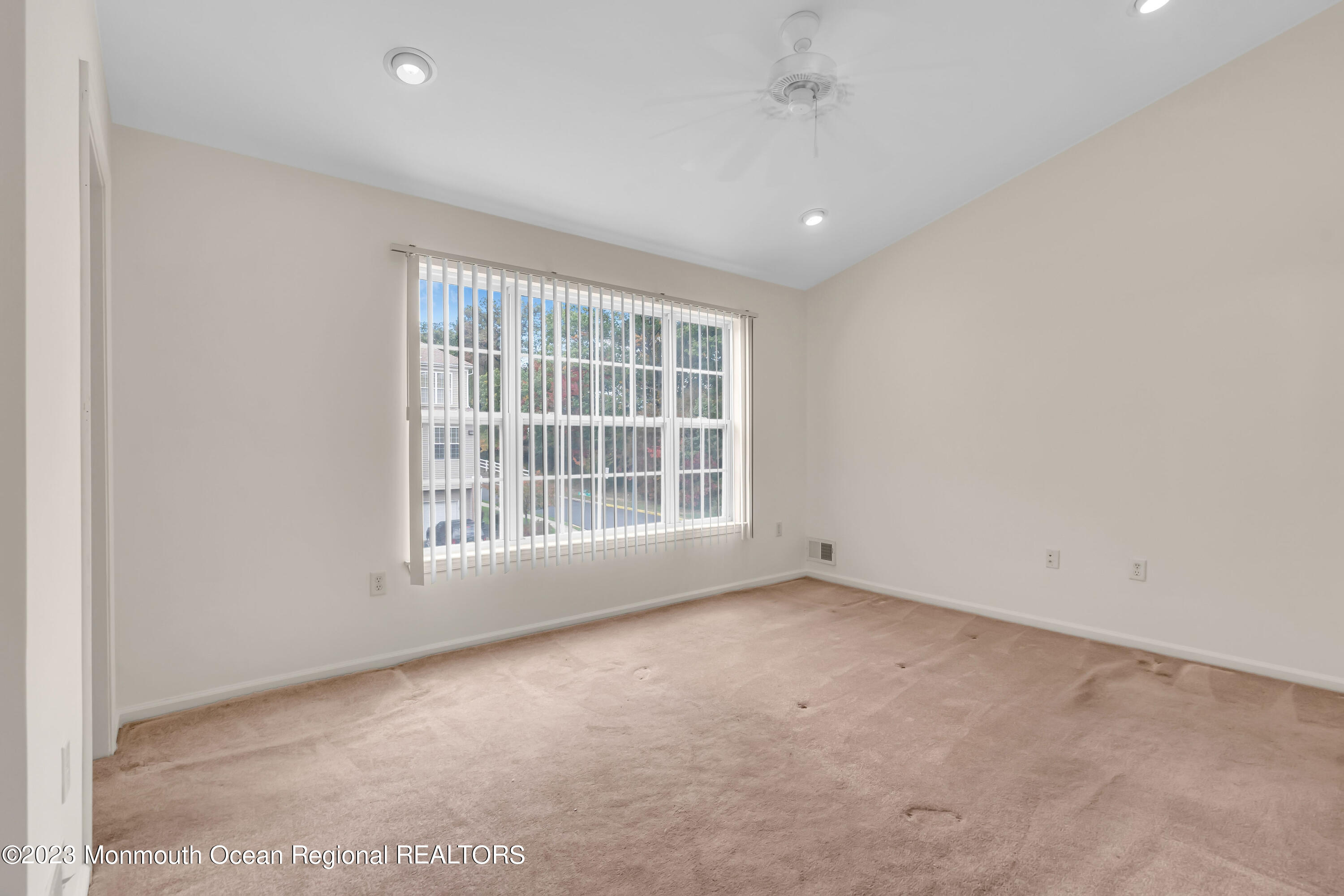 11 Kosmoski Terrace, Unit 106 Parlin, NJ 08859 - Photo 12 of 19 an empty room with a window