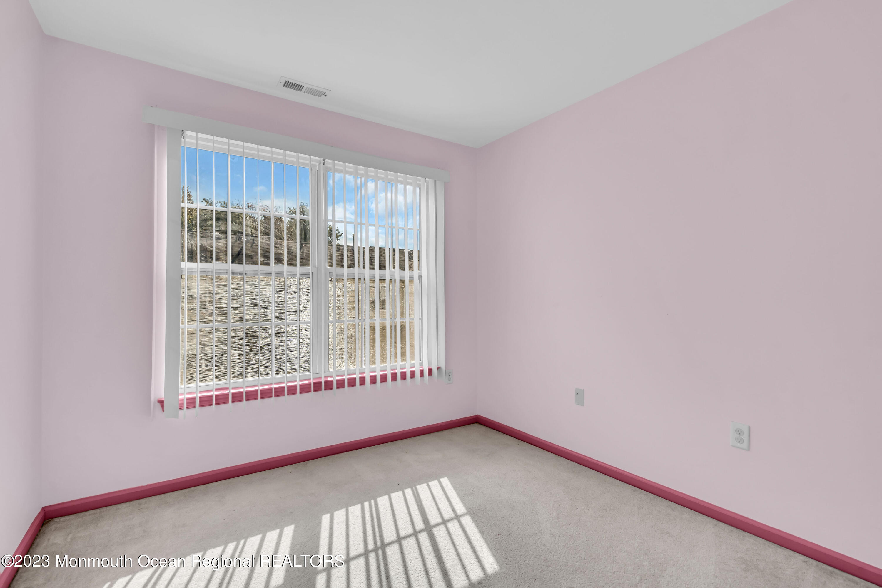11 Kosmoski Terrace, Unit 106 Parlin, NJ 08859 - Photo 15 of 19 a view of an empty room with a window