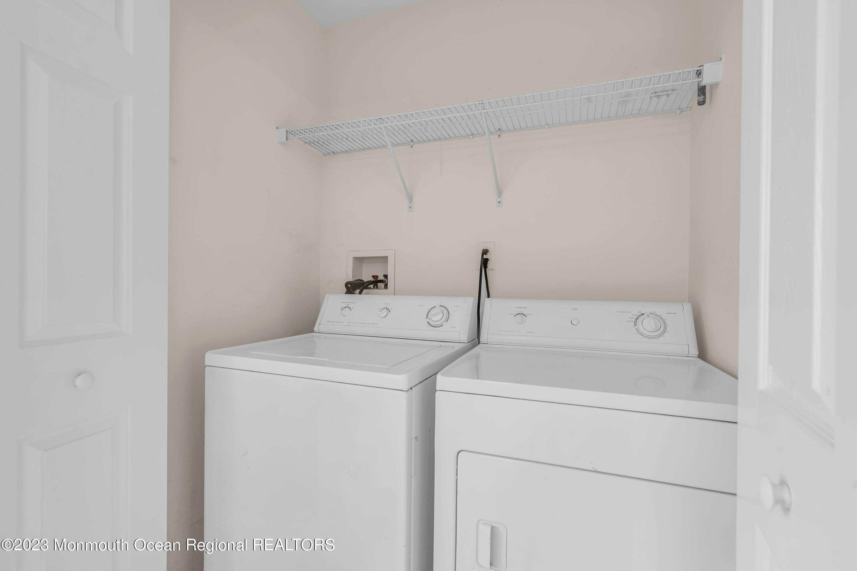 11 Kosmoski Terrace, Unit 106 Parlin, NJ 08859 - Photo 16 of 19 a utility room with dryer and washer