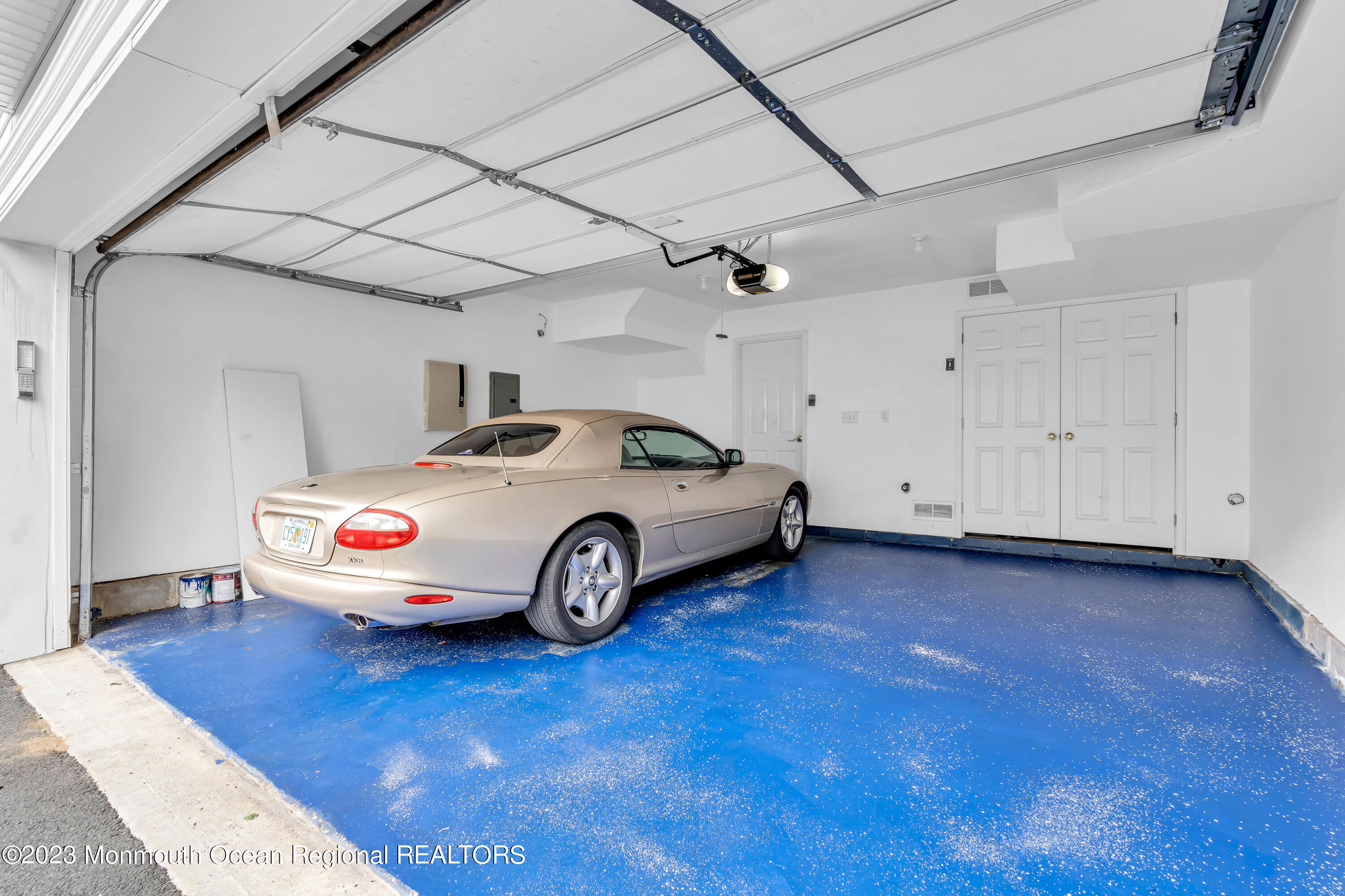 11 Kosmoski Terrace, Unit 106 Parlin, NJ 08859 - Photo 17 of 19 a car parked in a garage