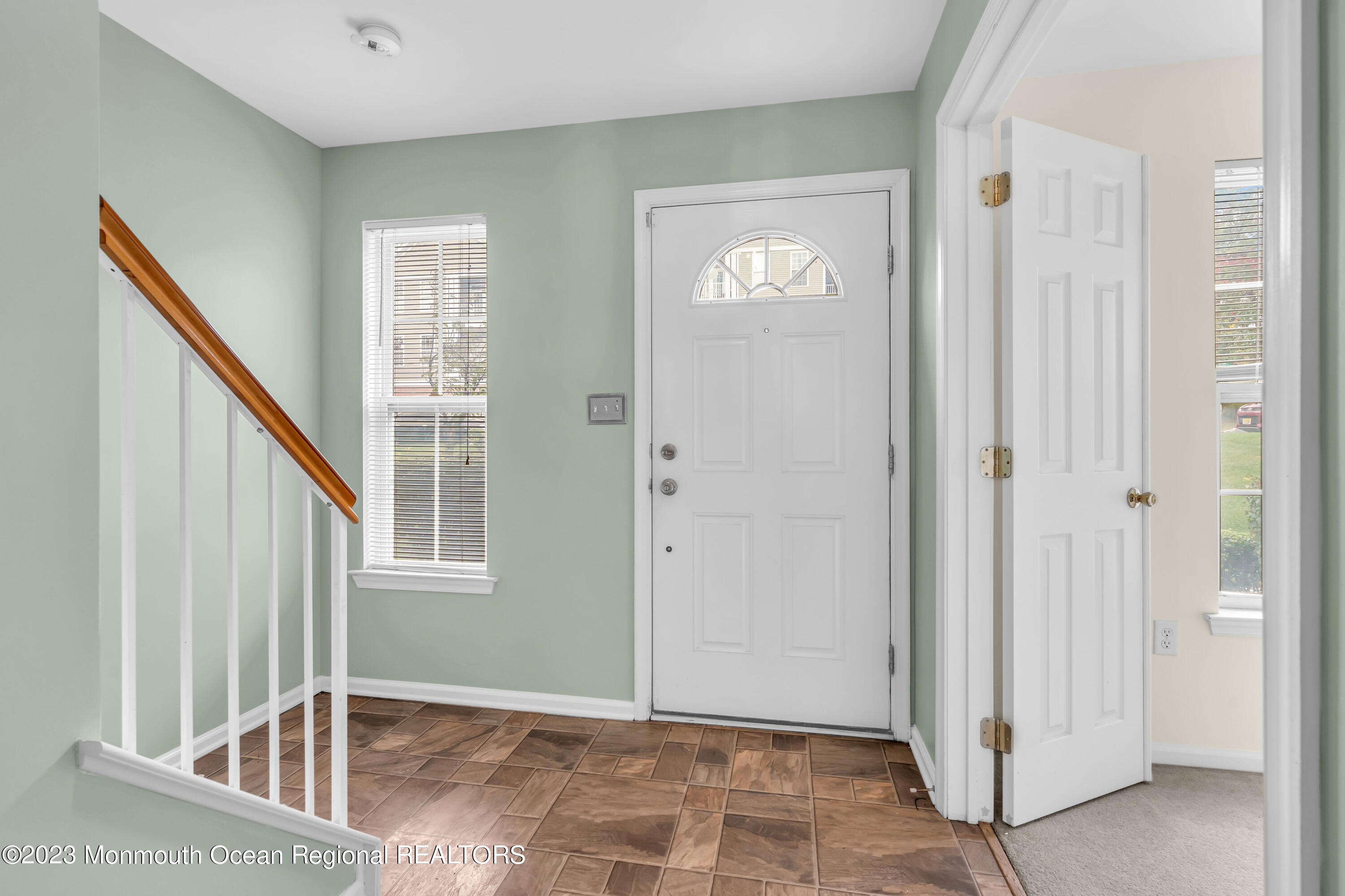 11 Kosmoski Terrace, Unit 106 Parlin, NJ 08859 - Photo 3 of 19 a view of an entryway with front door