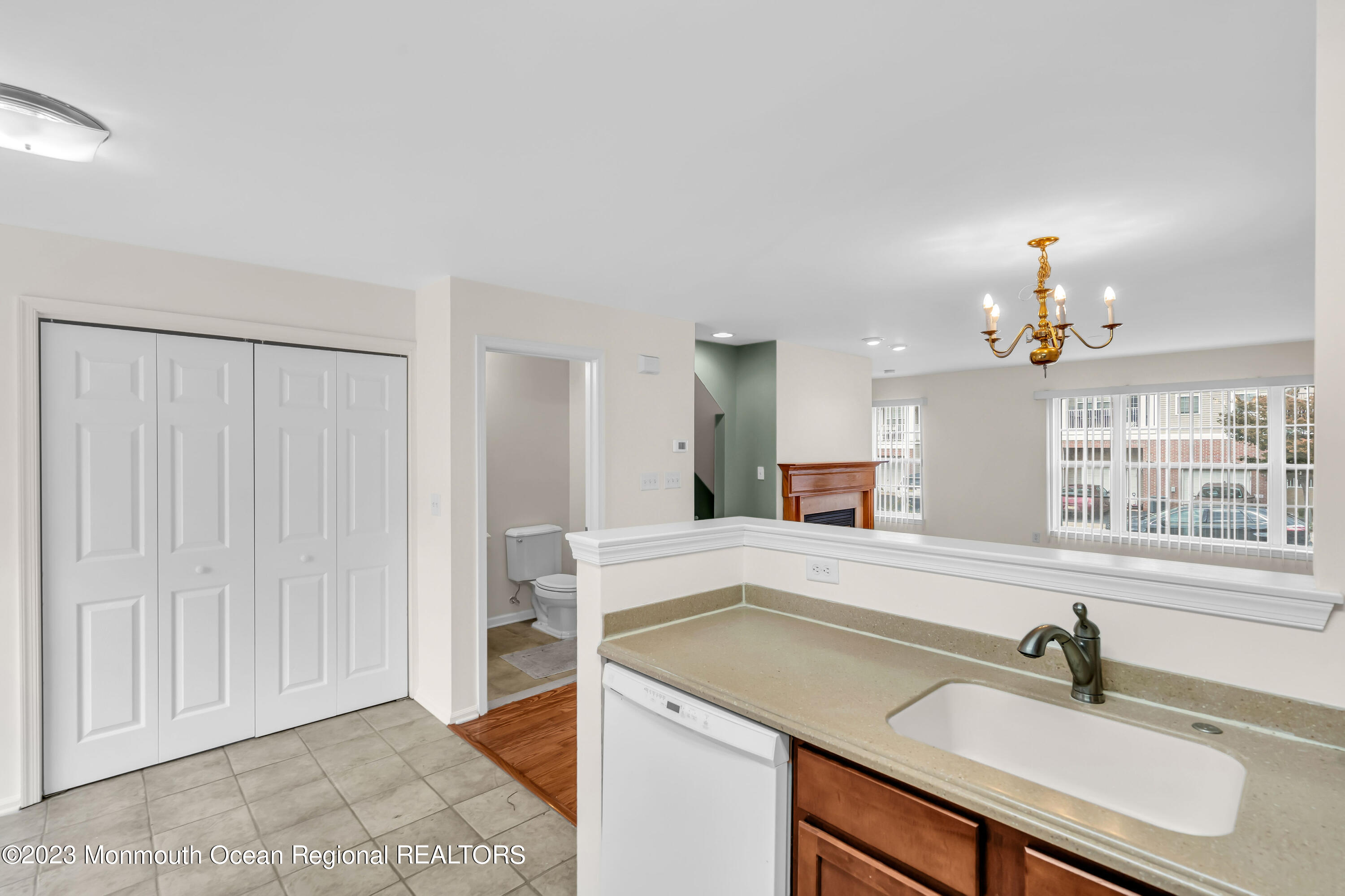 11 Kosmoski Terrace, Unit 106 Parlin, NJ 08859 - Photo 7 of 19 a bathroom with a sink and a mirror
