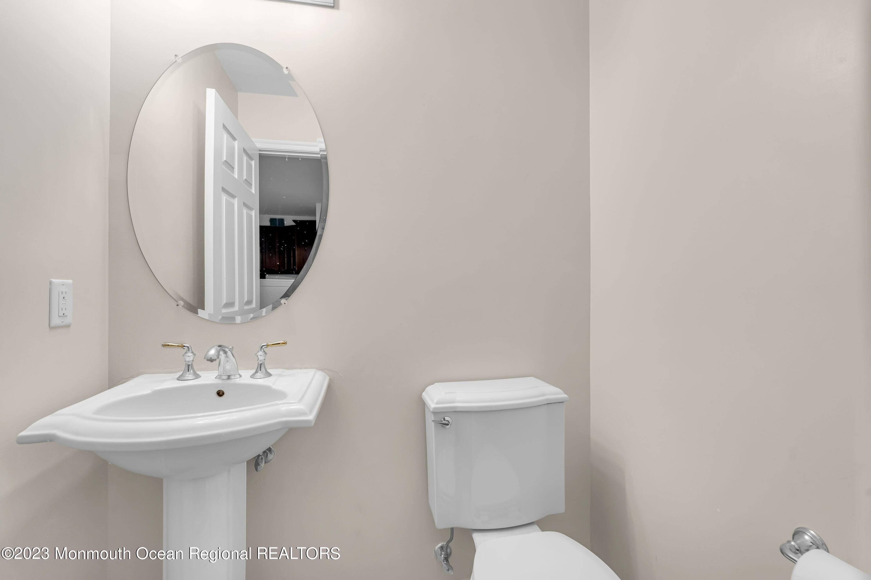 11 Kosmoski Terrace, Unit 106 Parlin, NJ 08859 - Photo 9 of 19 a bathroom with a toilet sink and mirror