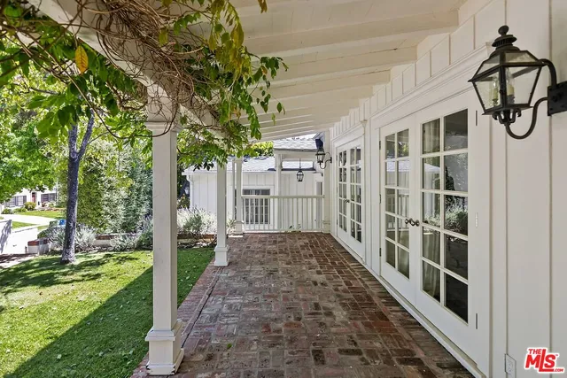a view of a porch with a yard