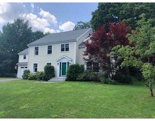 64 Chesterton Road Wellesley, MA 02481 - Photo 1 of 18 a front view of a house with a yard