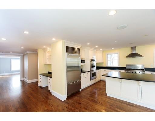 64 Chesterton Road Wellesley, MA 02481 - Photo 12 of 18 a kitchen with stainless steel appliances granite countertop a refrigerator a sink a stove and oven