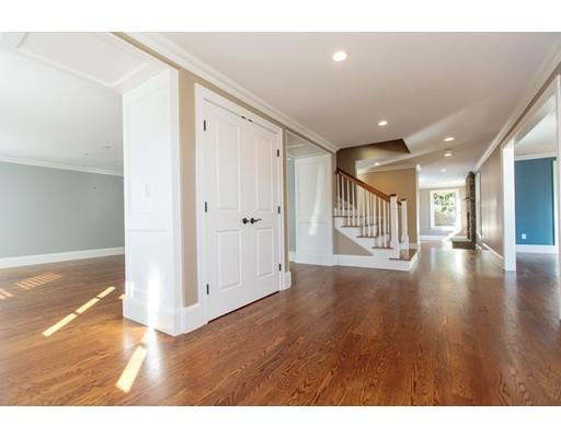 64 Chesterton Road Wellesley, MA 02481 - Photo 2 of 18 a view of an empty room with wooden floor