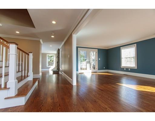 64 Chesterton Road Wellesley, MA 02481 - Photo 5 of 18 a view of an empty room with wooden floor and a window