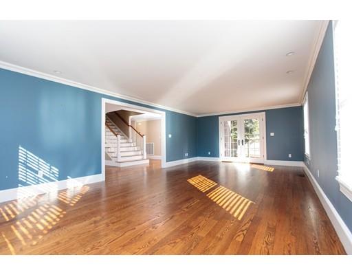 64 Chesterton Road Wellesley, MA 02481 - Photo 6 of 18 a view of an empty room with window and wooden floor