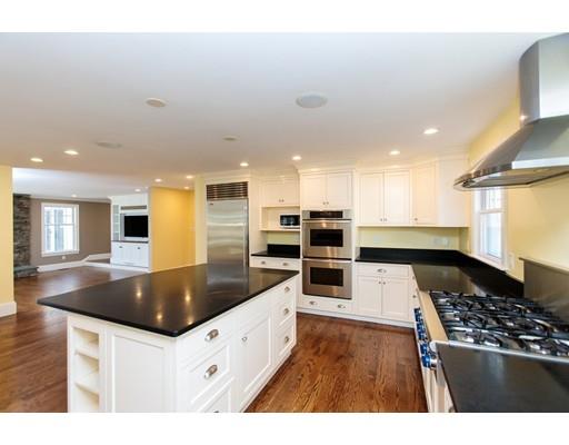 64 Chesterton Road Wellesley, MA 02481 - Photo 10 of 18 a kitchen with stainless steel appliances granite countertop a sink a stove and a wooden floors