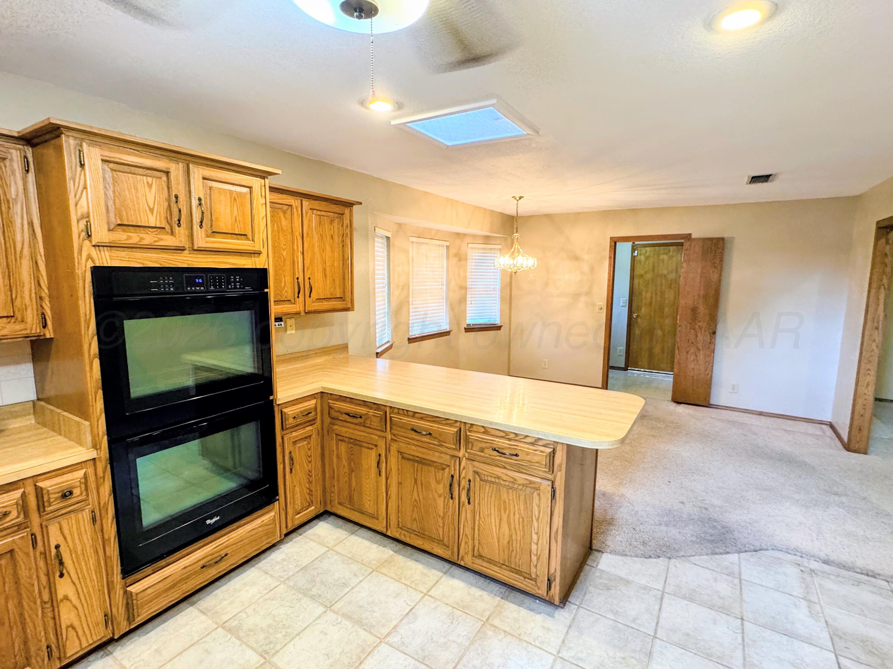 1810 Texas Street Perryton, TX 79070 - Photo 6 of 24 1810 TEXAS KITCHEN 2