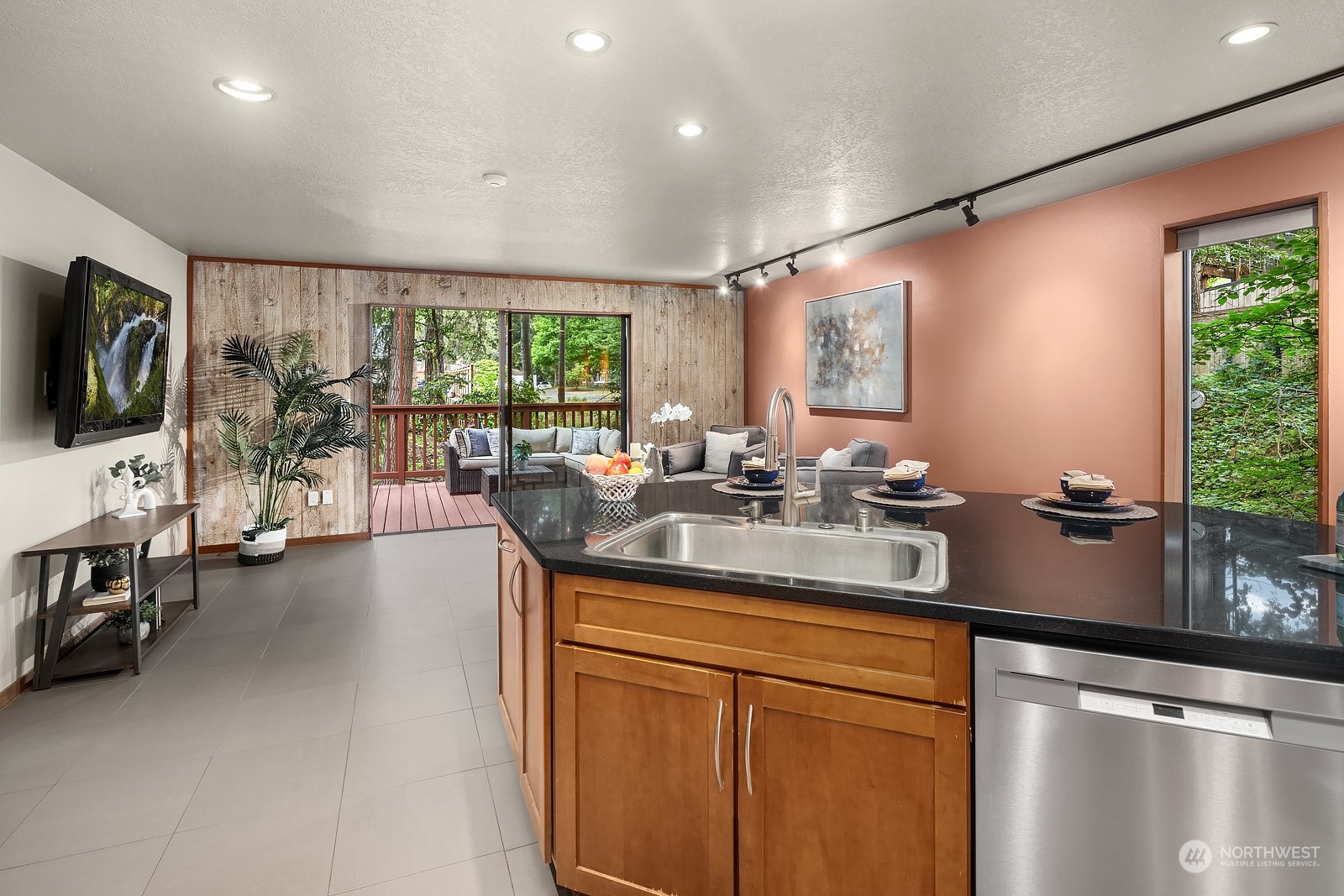 16117 Southeast 145th Place Renton, WA 98059 - Photo 13 of 38 a kitchen with stainless steel appliances granite countertop sink stove and cabinets