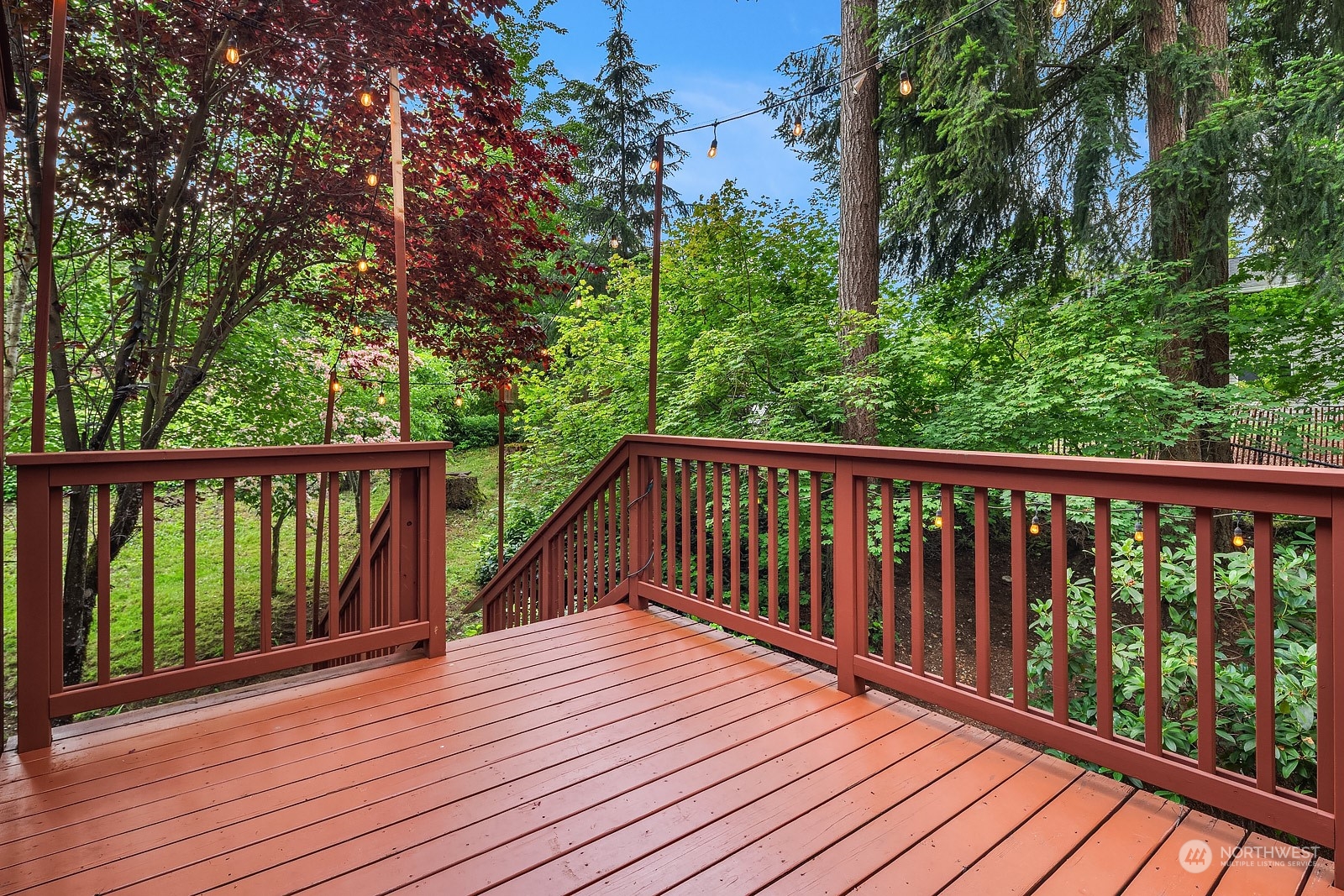 16117 Southeast 145th Place Renton, WA 98059 - Photo 16 of 38 a view of balcony with wooden floor and fence