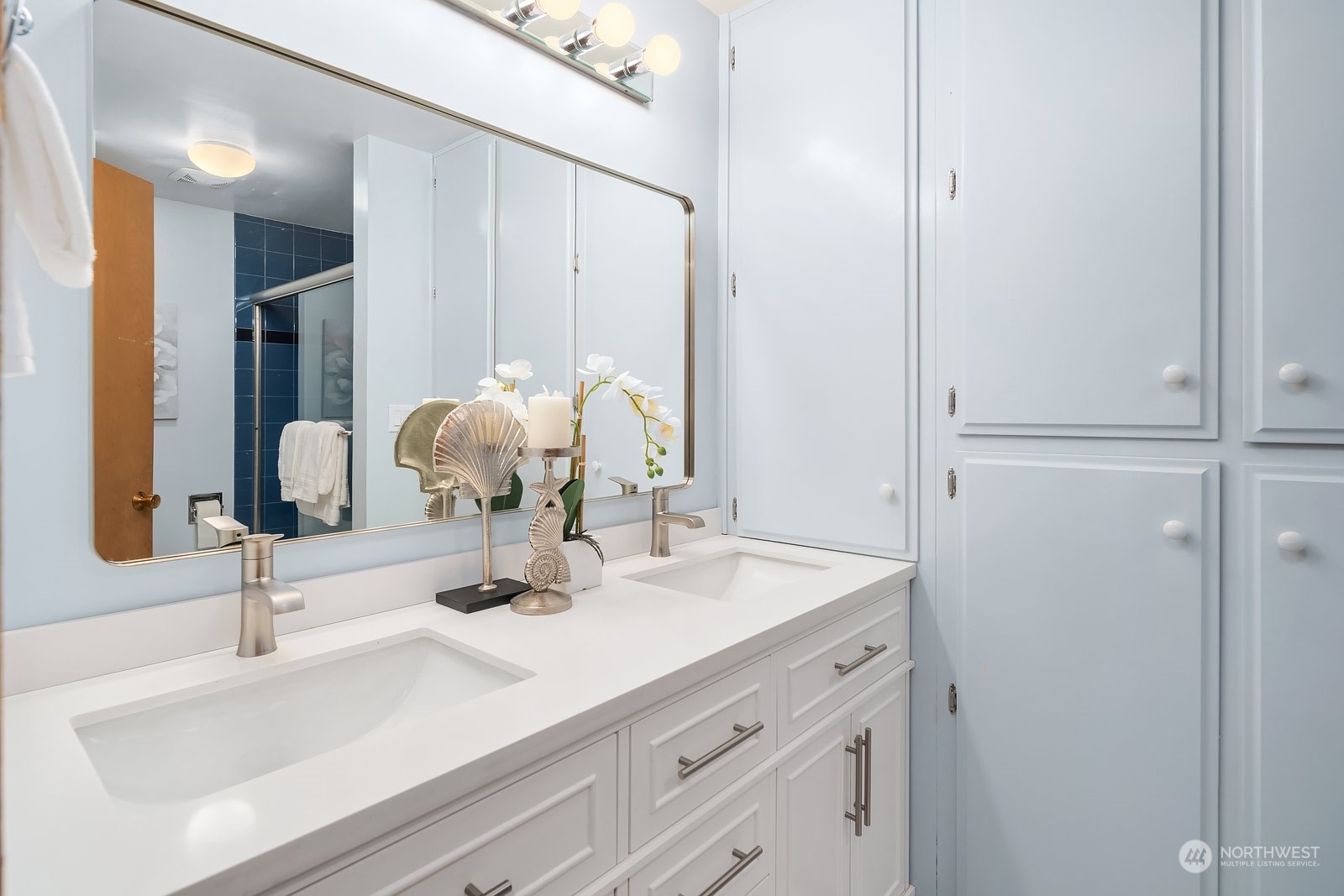 16117 Southeast 145th Place Renton, WA 98059 - Photo 24 of 38 a bathroom with a sink and a mirror