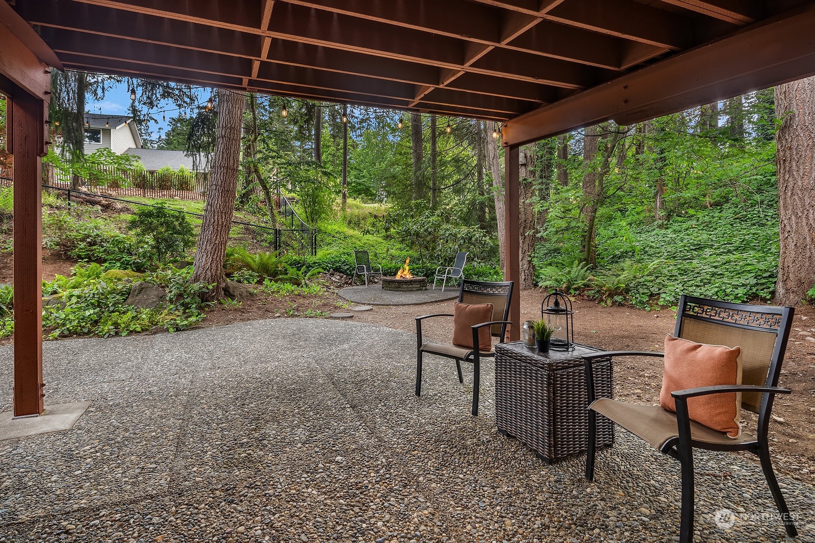 16117 Southeast 145th Place Renton, WA 98059 - Photo 32 of 38 a view of a patio with table and chairs and potted plants