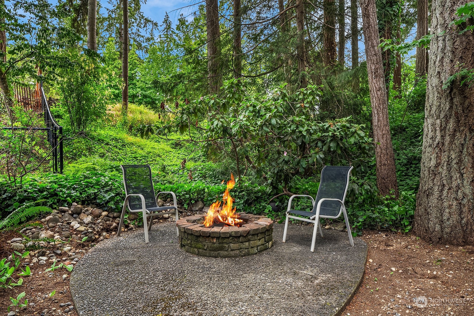 16117 Southeast 145th Place Renton, WA 98059 - Photo 34 of 38 a view of a backyard with sitting area and garden