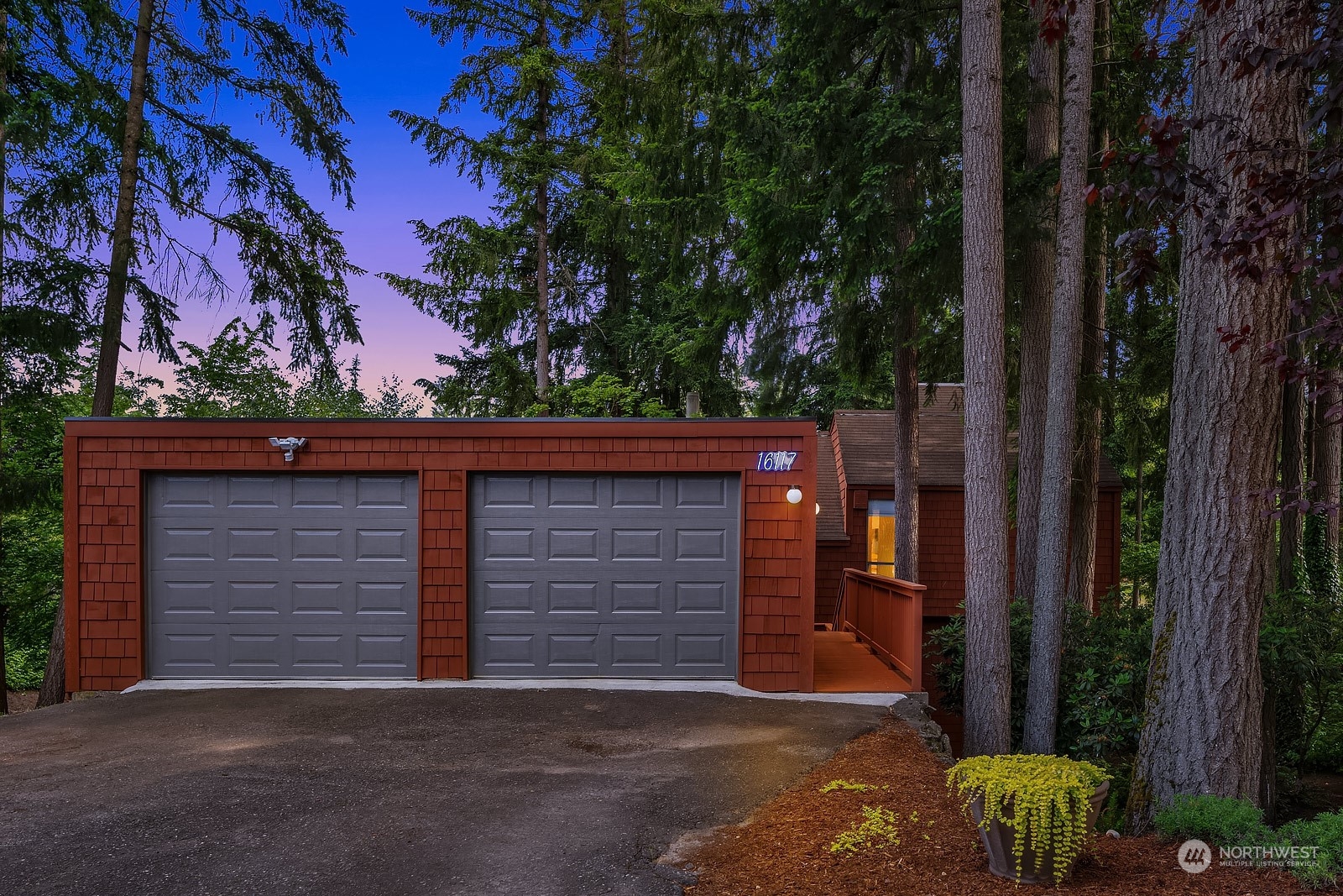16117 Southeast 145th Place Renton, WA 98059 - Photo 35 of 38 a front view of a house with a yard and garage