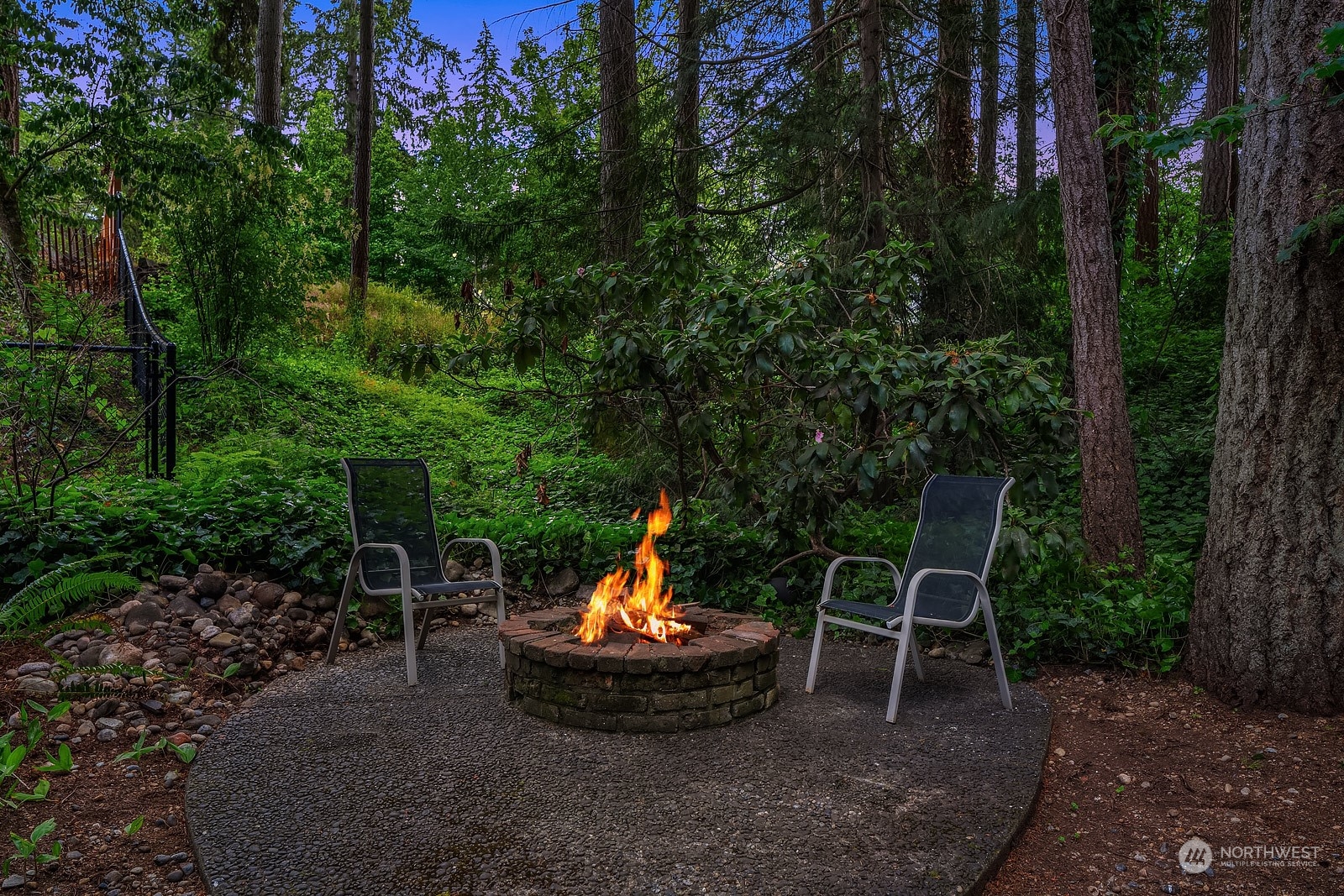 16117 Southeast 145th Place Renton, WA 98059 - Photo 36 of 38 a backyard of a house with yard fire pit and outdoor seating