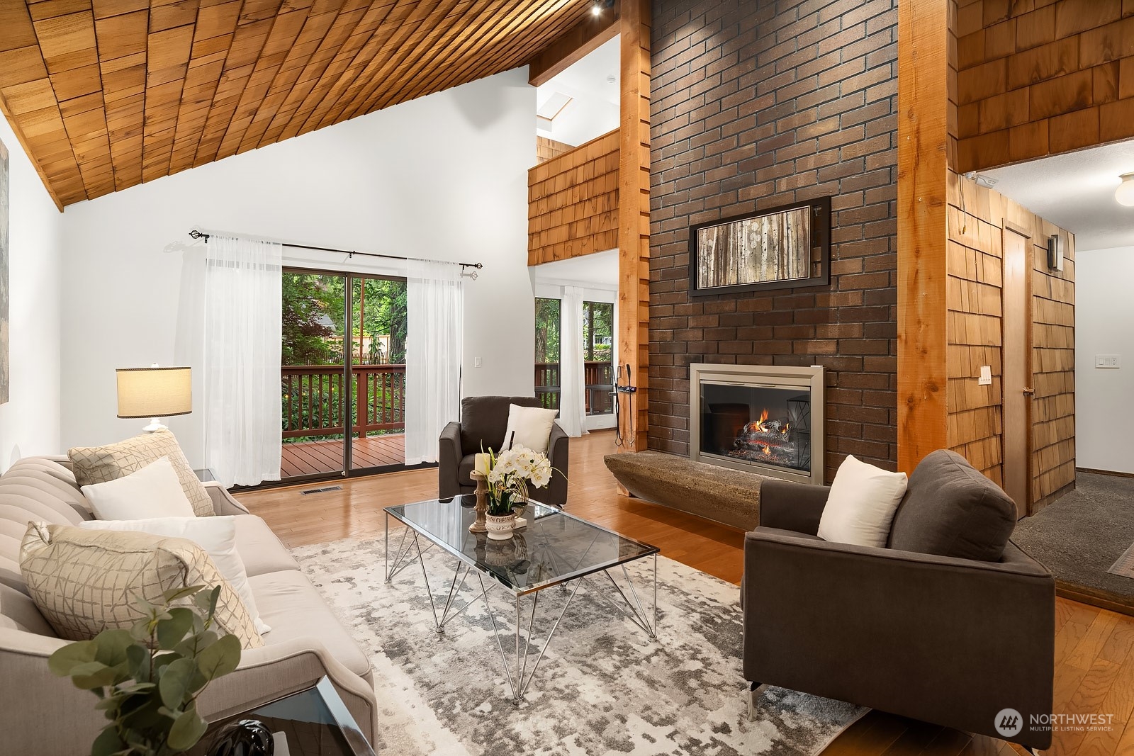 16117 Southeast 145th Place Renton, WA 98059 - Photo 4 of 38 a living room with furniture large window and a fireplace