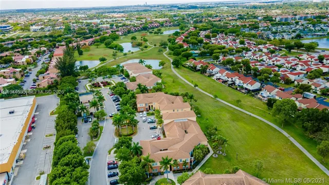 an aerial view of a city with lots of residential buildings