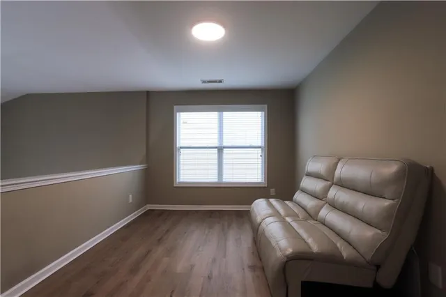 a room with furniture and a window