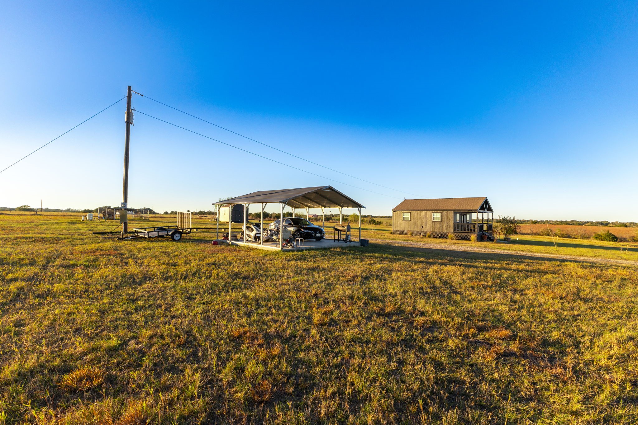 0 Schulze Road Muldoon, TX 78949 - Photo 15 of 28 a front view of a house with two chairs
