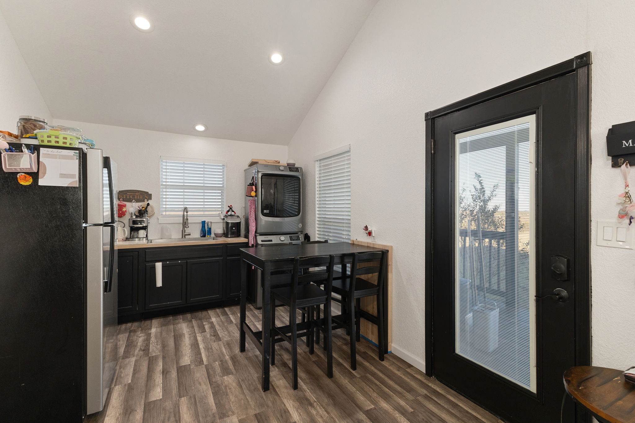 0 Schulze Road Muldoon, TX 78949 - Photo 19 of 28 a kitchen with stainless steel appliances a refrigerator and microwave