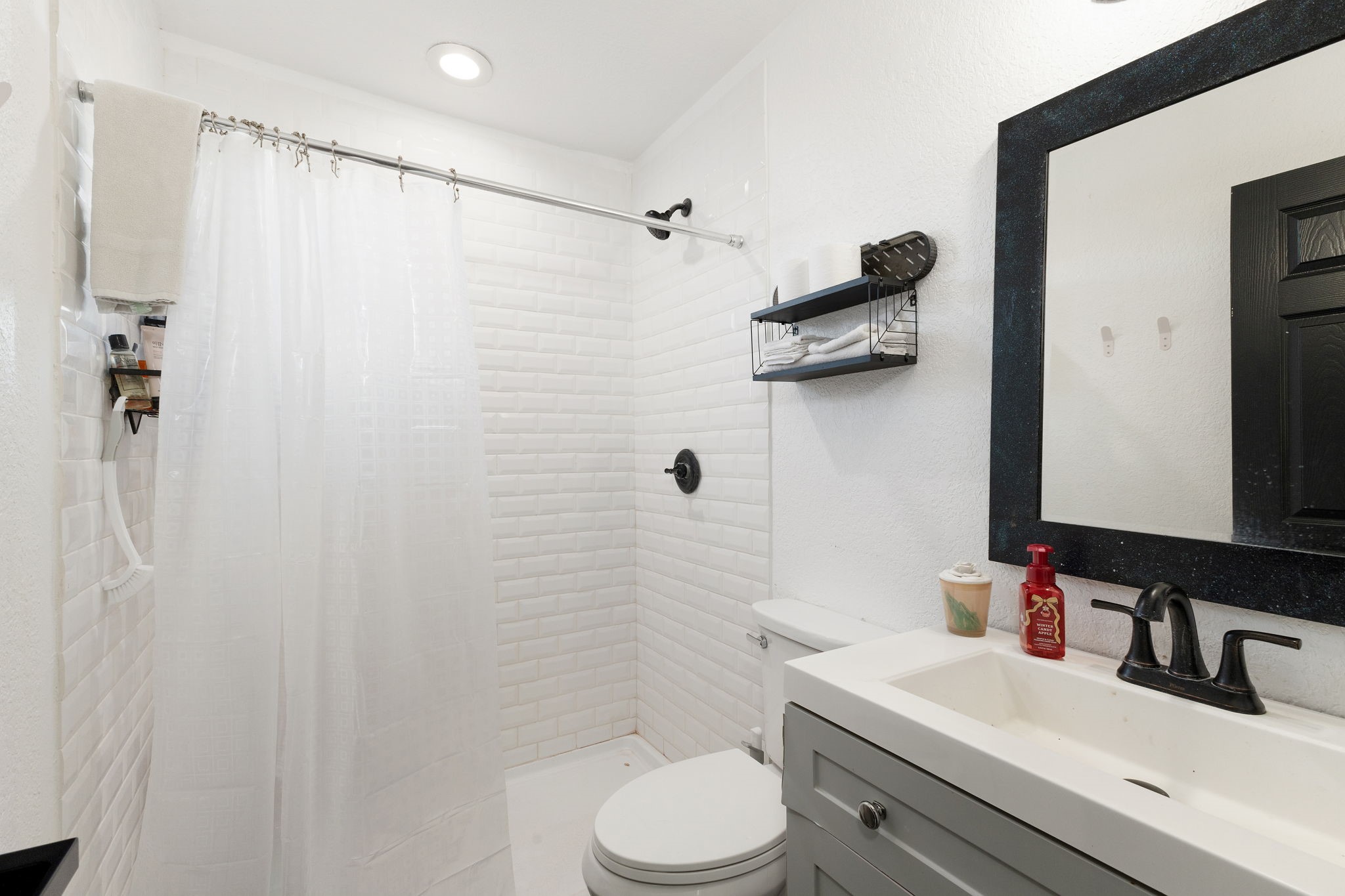 0 Schulze Road Muldoon, TX 78949 - Photo 22 of 28 a bathroom with a sink a toilet and shower