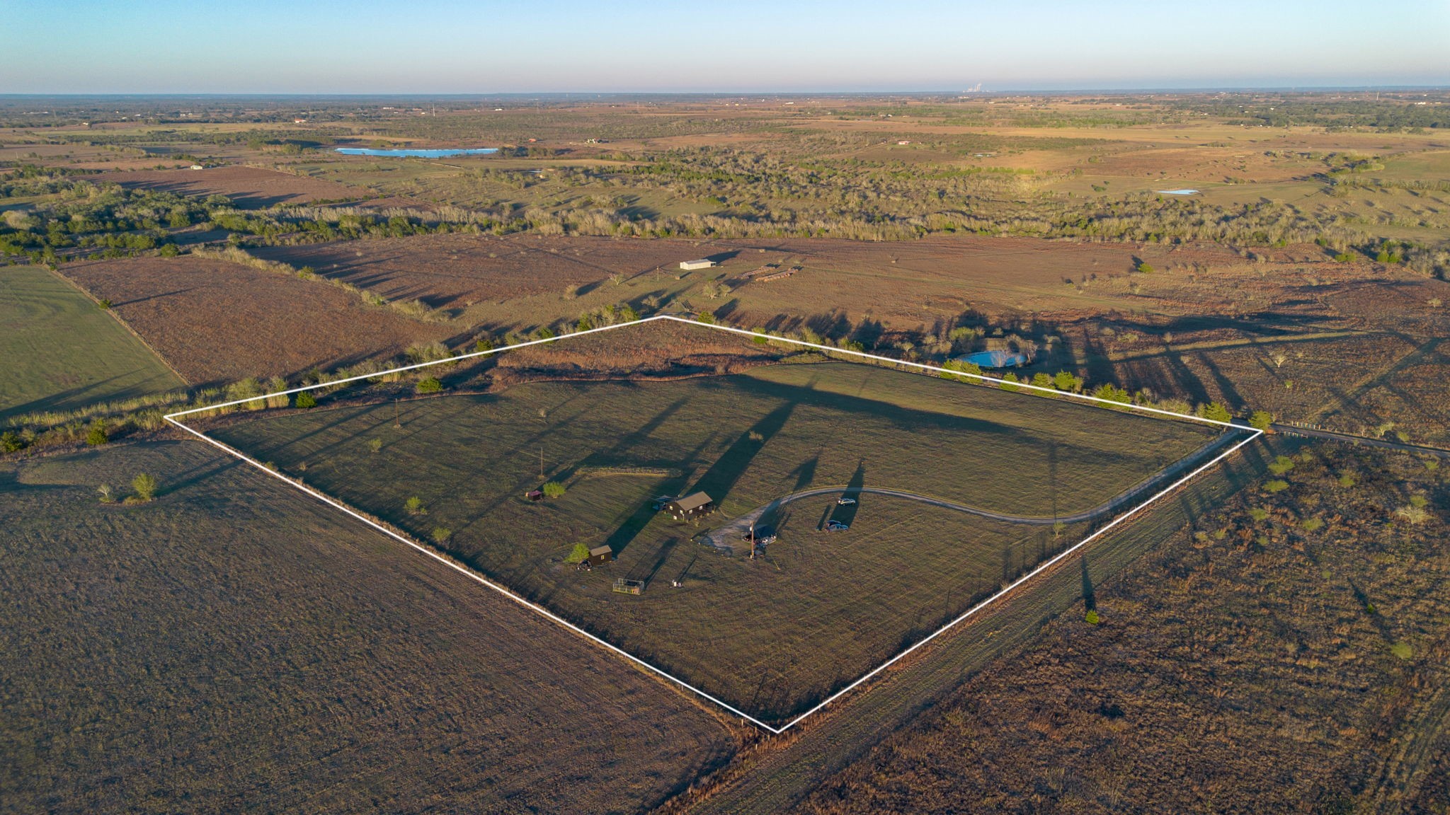 0 Schulze Road Muldoon, TX 78949 - Photo 5 of 28 an aerial view of residential houses with outdoor space