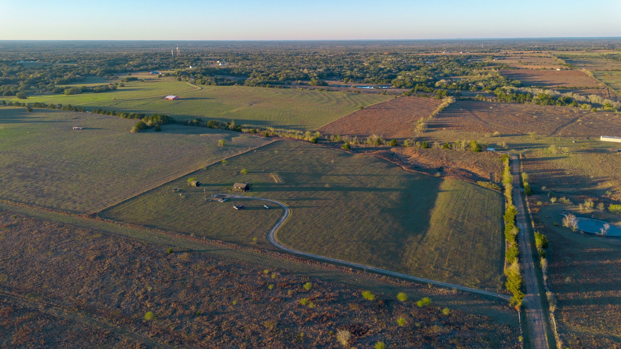 0 Schulze Road Muldoon, TX 78949 - Photo 7 of 28 an aerial view of ocean with residential house and outdoor space