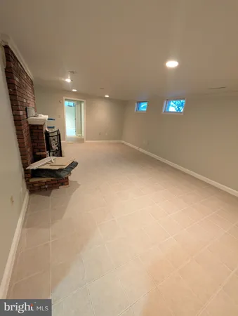a view of a livingroom and a fireplace