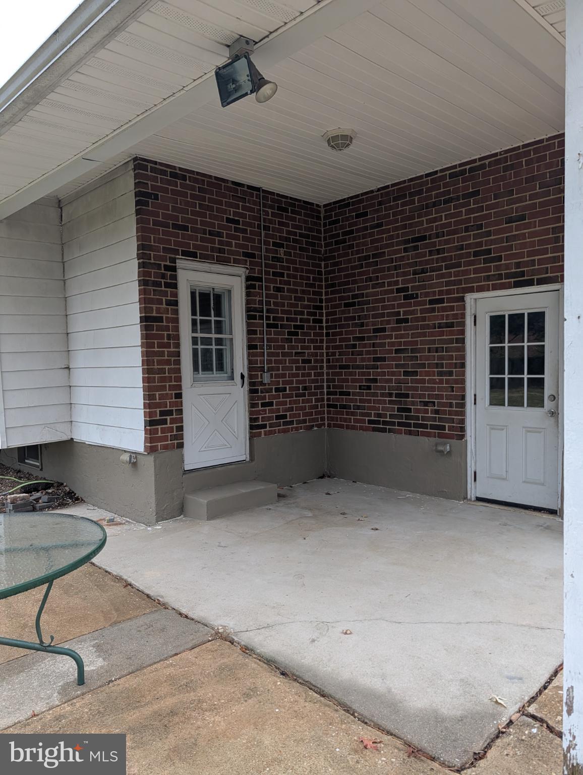 20 Dale Court Wilmington, DE 19810 - Photo 30 of 33 a view of an empty room with a fireplace and a window
