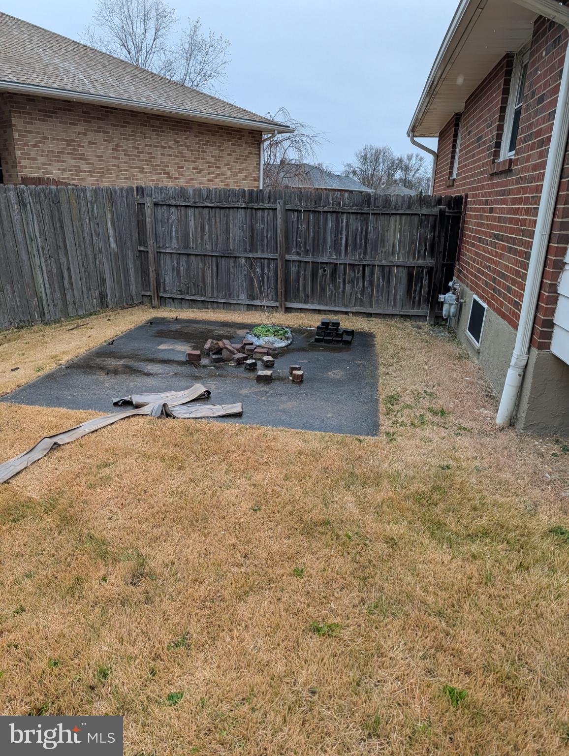 20 Dale Court Wilmington, DE 19810 - Photo 32 of 33 a view of a backyard with wooden fence