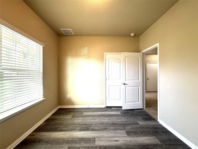 a view of bathroom with a tub and shower