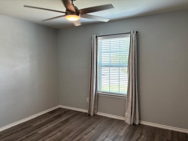515 Rustic Meadows Trail Princeton, TX 75407 - Photo 12 of 28 an empty room with wooden floor closet and windows