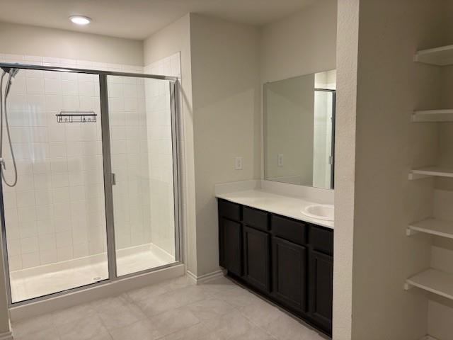 515 Rustic Meadows Trail Princeton, TX 75407 - Photo 18 of 28 a bathroom with a shower sink and mirror