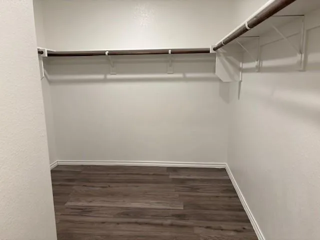 a view of an empty walk in closet