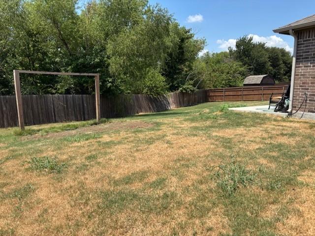 515 Rustic Meadows Trail Princeton, TX 75407 - Photo 27 of 28 a view of backyard with small cabin