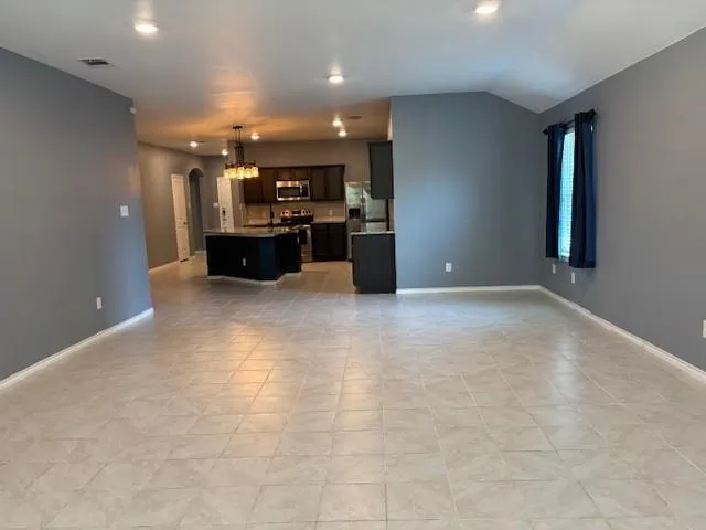 a view of a kitchen with a sink